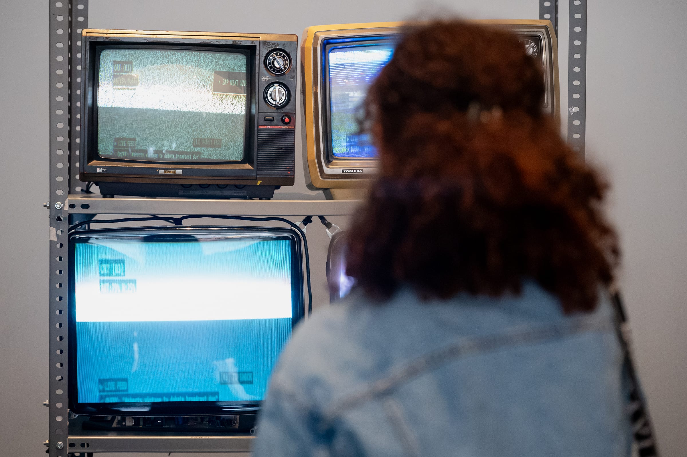 Close-up of CRT [01} and CRT [03] showing the ZAP NEXT VID trigger overlay, simulated scanlines, and live query synthesis telemetry
